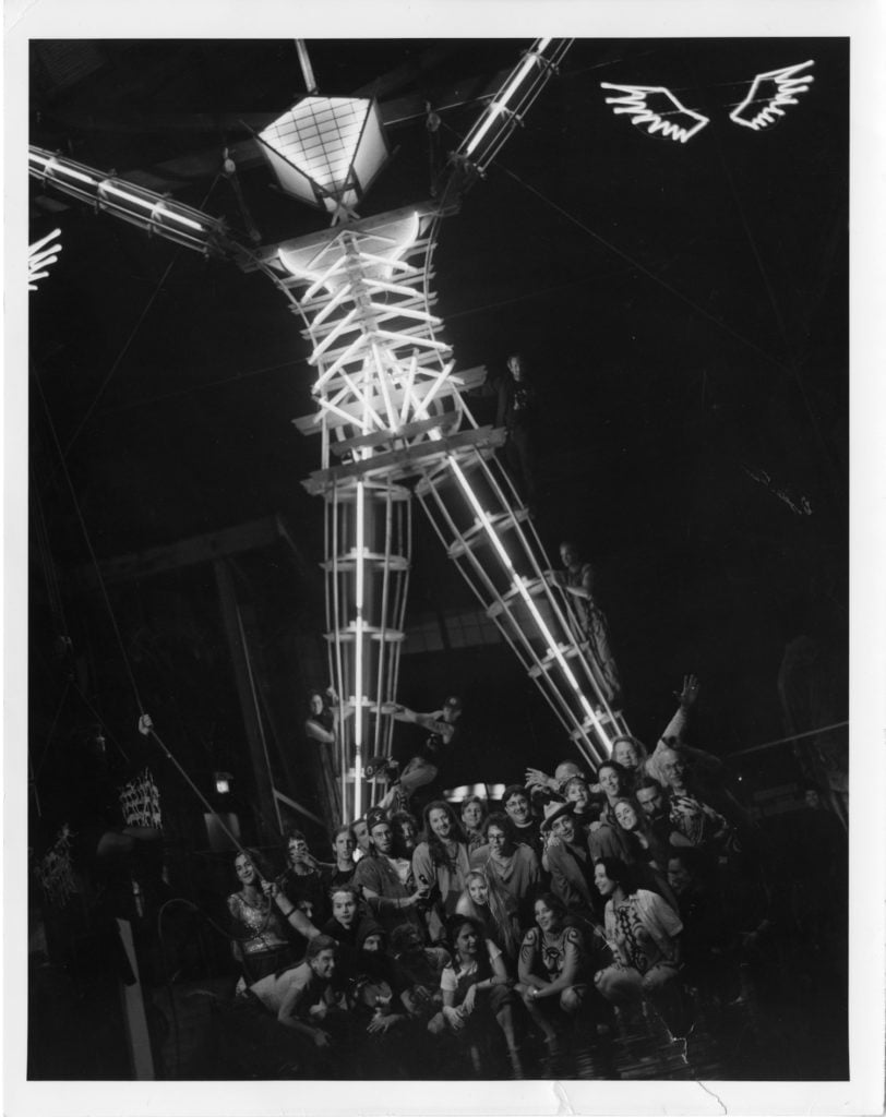 A. Leo Nash, photograph of Burning Man guests with the man statue. Courtesy of the Nevada Museum of Art. 