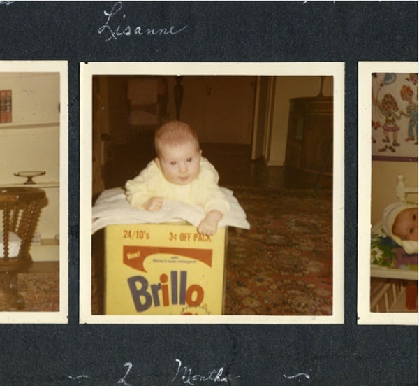 Lisanne Skyler as an infant with the plexiglass-enclosed Warhol Brillo Box her parents acquired in 1969. Photo courtesy Lisanne Skyler.