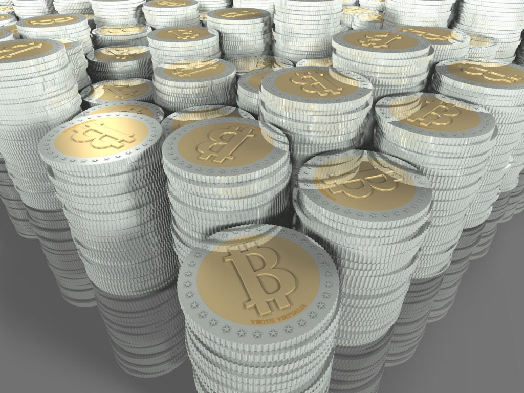 Bitcoin piles. Courtesy Flickr.