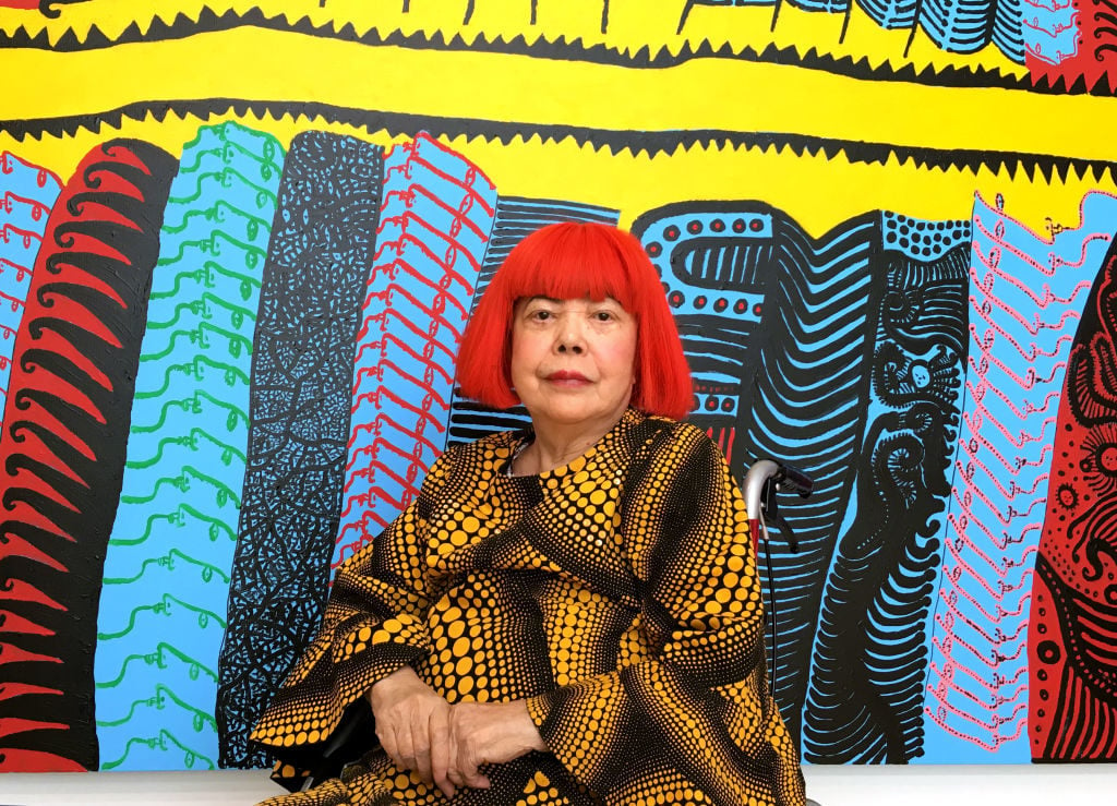 Yayoi Kusama with recent works her new museum in Tokyo, Japan on January 16, 2017. Photo by Anna Fifield/The Washington Post via Getty Images.