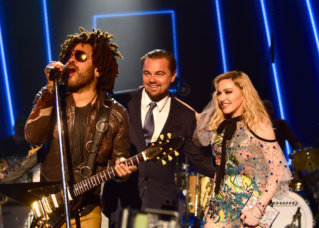 Leonardo DiCaprio performs with Lenny Kravitz and Madonna during the Leonardo DiCaprio Foundation 4th Annual Saint-Tropez Gala at Domaine Bertaud Belieu. (Photo by Anthony Ghnassia/Getty Images for LDC Foundation)
