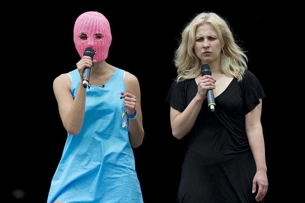 Maria Alyokhina (right) and another member of Russian feminist punk rock protest group Pussy Riot have been briefly detained in Russia. Photo OLI SCARFF/AFP/Getty Images.