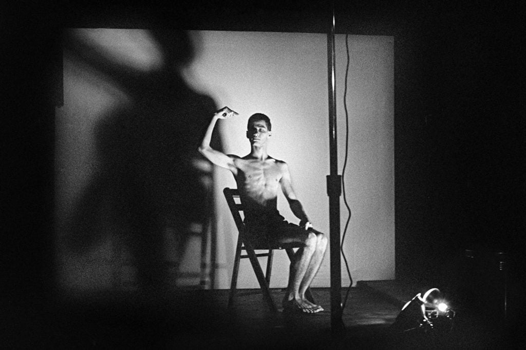 Larry Ashton taking part in "Acts of Live Art" at Club 57, 1980. Courtesy of the Museum of Modern Art. Photo: Joesph Szkodzinski. Courtesy Joesph Szkodzinski.