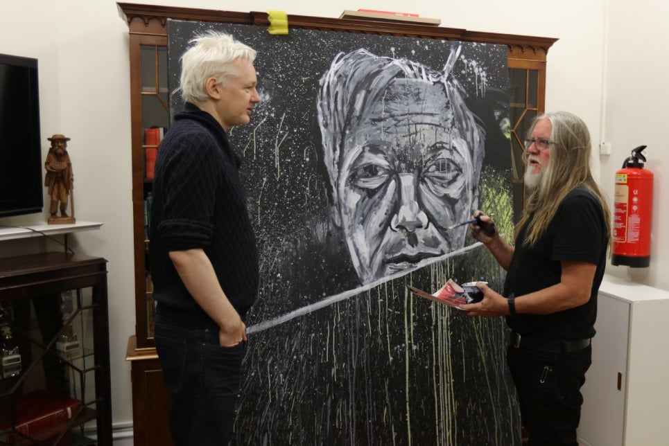 Artist George Gittoes with Julian Assange at the Ecuadorian Embassy in London. Courtesy of the artist.