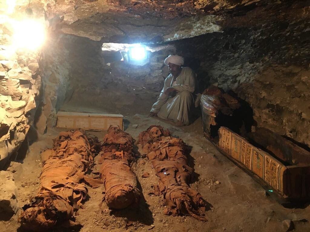 Egyptian archaeologists unearthing mummies at a newly-uncovered ancient tomb in Luxor. Courtesy of the Egyptian Antiquities Ministry.