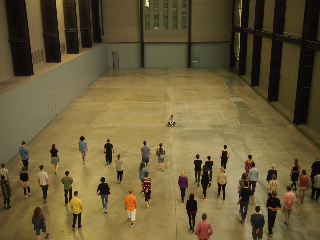 Tino Sehgal's <i>These Associations</i> at Tate's Turbine Hall. Image courtesy of the artist and Flickr.