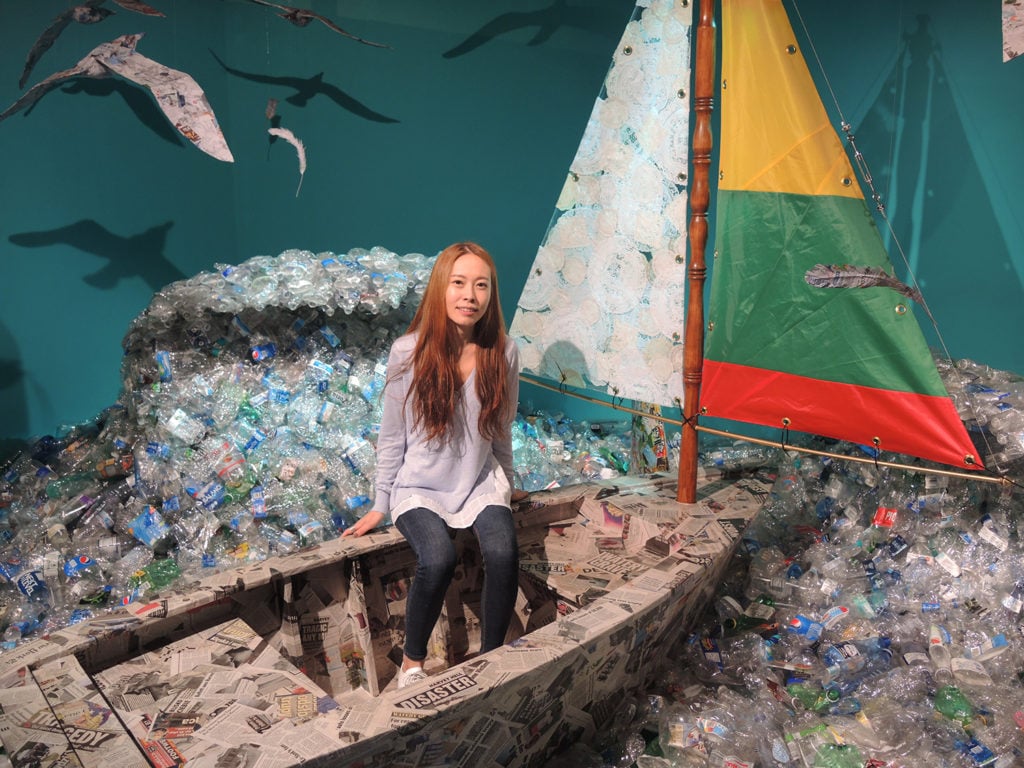 Jee Young Lee in her installation made of recycled materials at 29Rooms. Courtesy of Sarah Cascone. 