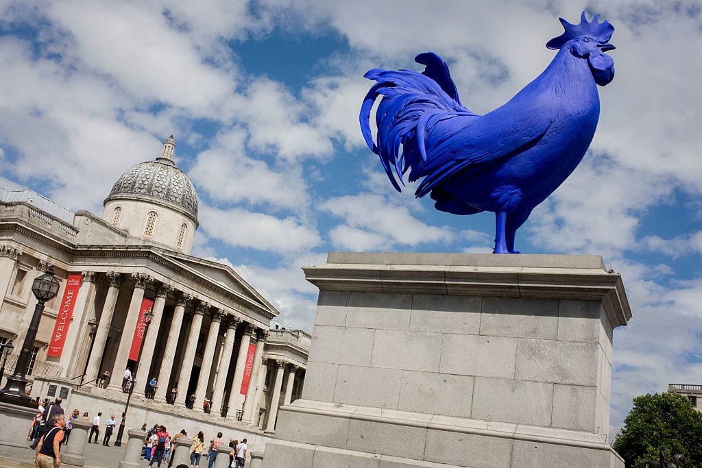 Katharina Fritsch's <em>Hahn/Cock</em>, in fibre glass and polyester resin, won the prestigious right to occupy Trafalgar Square's Fourth Plinth in London in 2013. (Photo by In Pictures Ltd./Corbis via Getty Images)