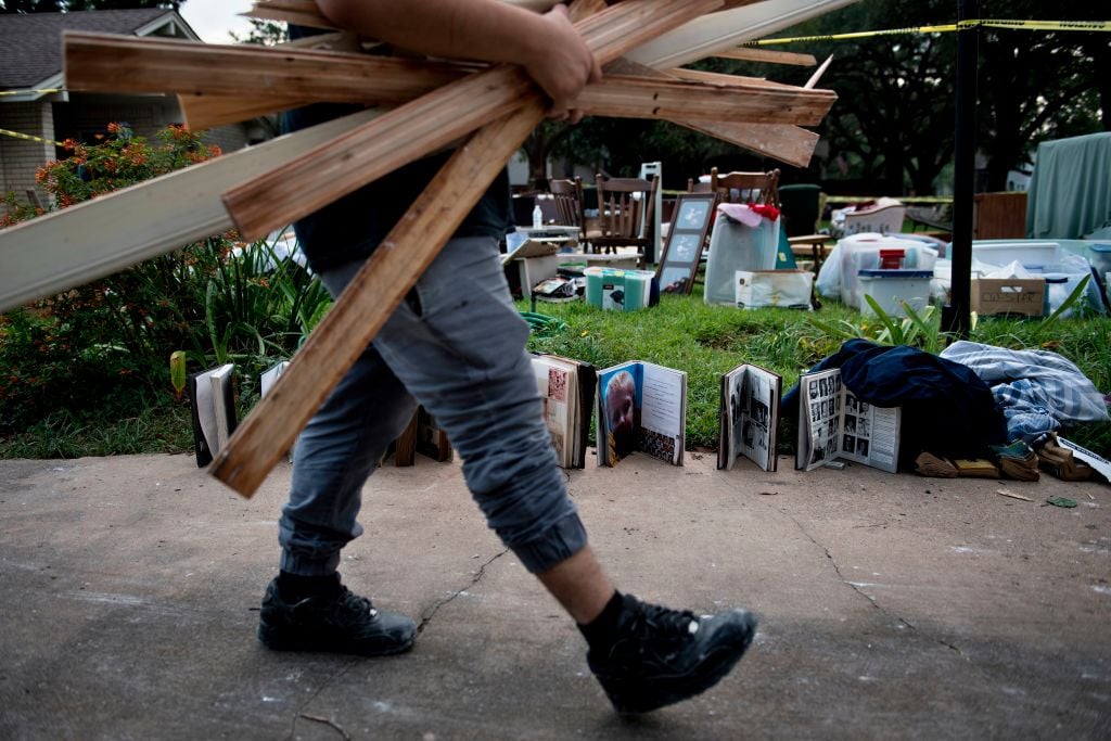 Salvaged personal items from a once flooded home after the Hurricane in Houston. Photo: Brendan Smialowski/AFP/Getty images.