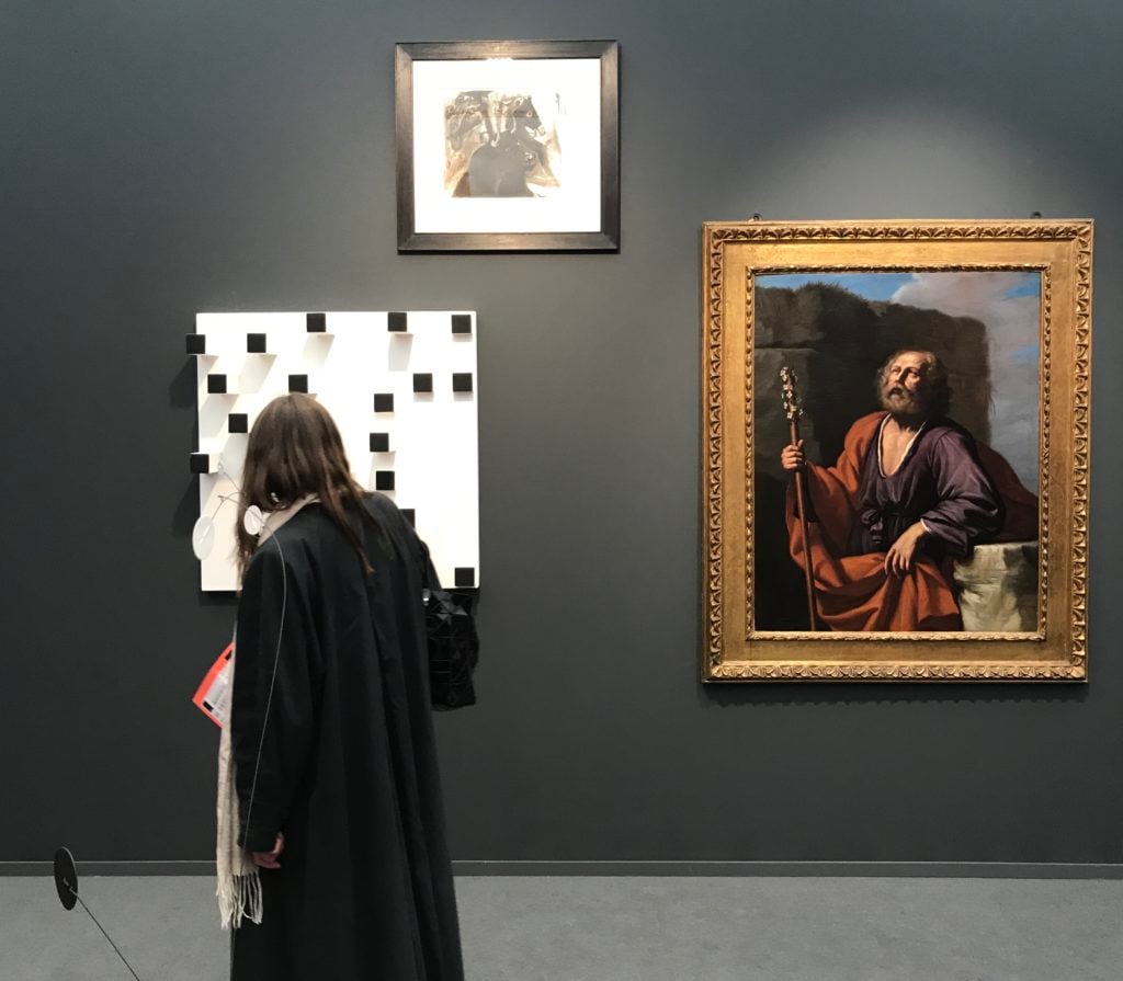 A lucky visitor admires the booth shared by Hauser & Wirth and Moretti at Frieze Masters 2017. Photo by Andrew Goldstein.