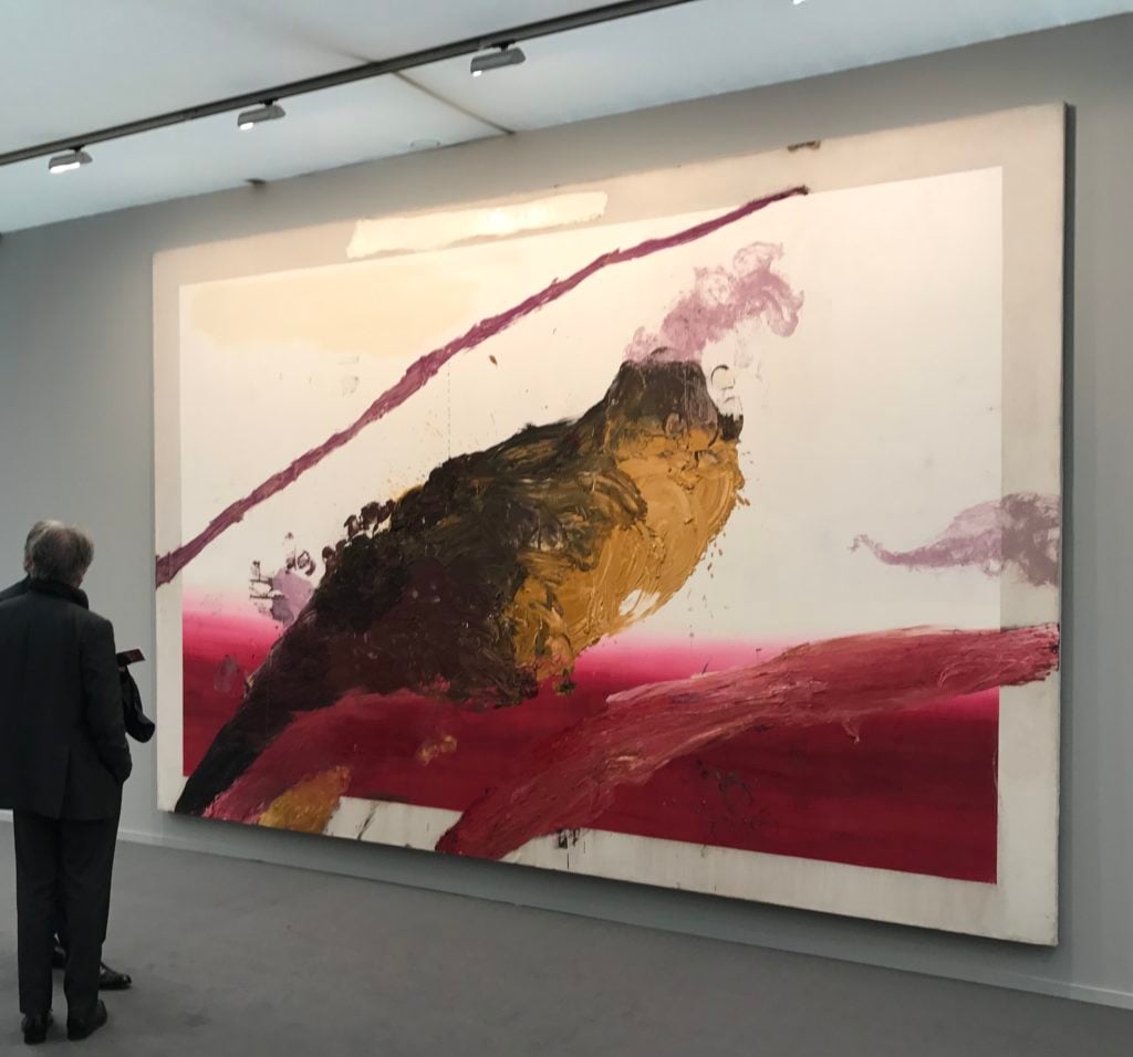Visitors take in Julian Schnabel's Untitled (Pink Painting), 1994, at Blum & Poe's Frieze Masters booth.