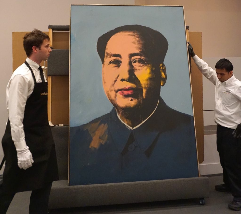 Andy Warhol's portrait of former Chinese leader Mao Zedong at Sotheby's in 2015. (Photo by Selcuk Acar/Anadolu Agency/Getty Images)