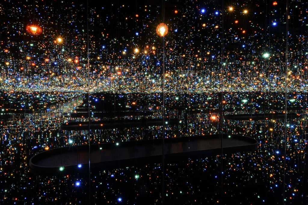 Yayoi Kusama, Infinity Mirrored Room –The ￼Souls of Millions of Light Years Away (2013). ￼Courtesy of David Zwirner, New York. © Yayoi Kusama. Photo by Cathy Carver.