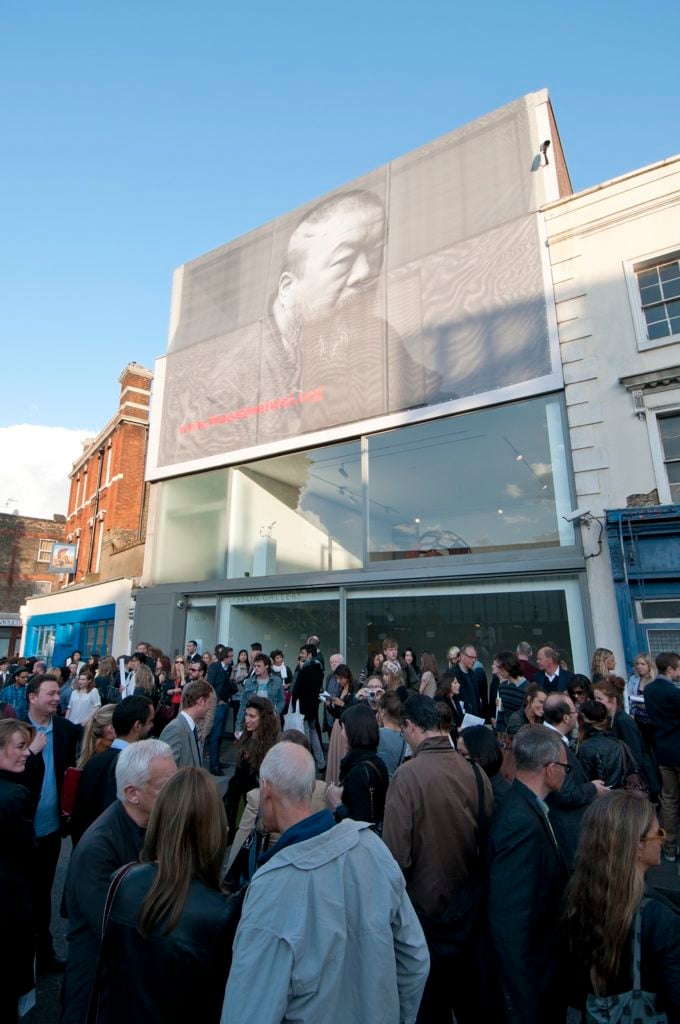 Outside of Ai Weiwei's first exhibtion at Lisson in London in 2011. The gallery supported the "Free Ai Weiwei" campaign through posters featuring Ai and examples of his writing: Words can be deleted, but the facts wont be deleted with them. Courtesy Lisson Gallery.