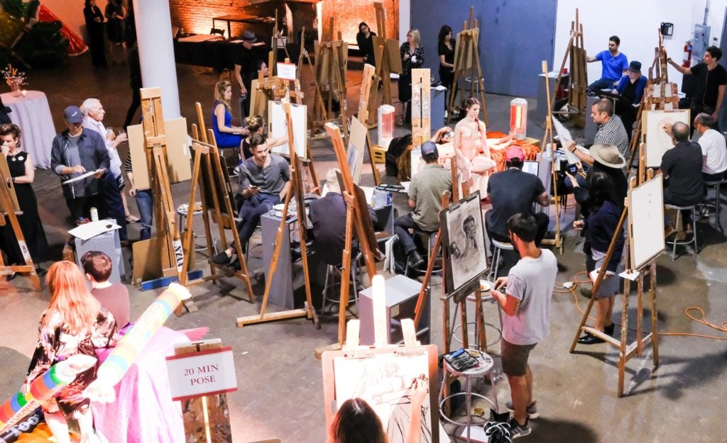 Artists working from live models at Will Cotton's "Drawing Party." Courtesy of the New York Academy of Art.