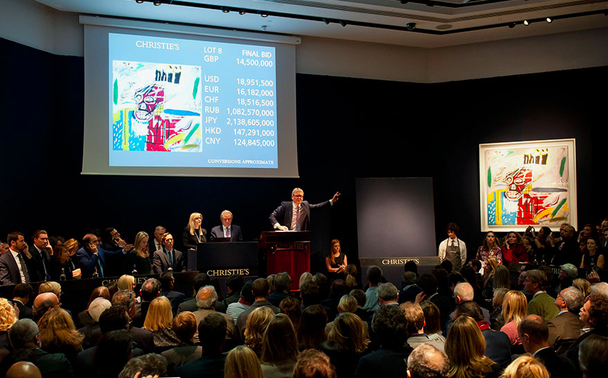 Jean-Michel Basquiat’s Red Skull (1982) being sold at Christie’s “Post-War and Contemporary Art Evening Auction” in London. Image courtesy Christie’s.