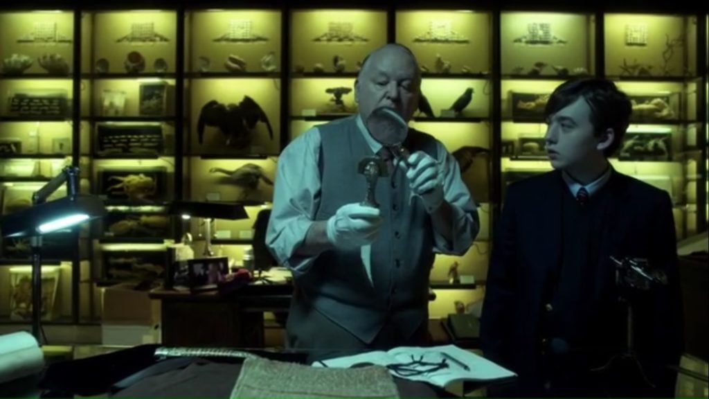 A Gotham Natural History Museum historian examines a mysterious dagger on behalf of Bruce Wayne on <em>Gotham</em>. Courtesy of FOX.