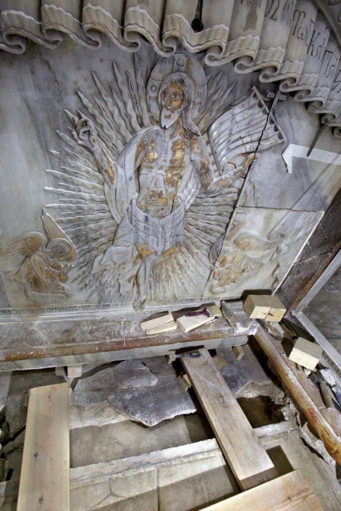The Tomb of Jesus, where his body is believed to have been laid, after it was exposed for the first time in centuries as part of conservation work on the Church of the Holy Sepulchre in Jerusalem's Old City. Photo courtesy Gali Tibbon/AFP/Getty Images.