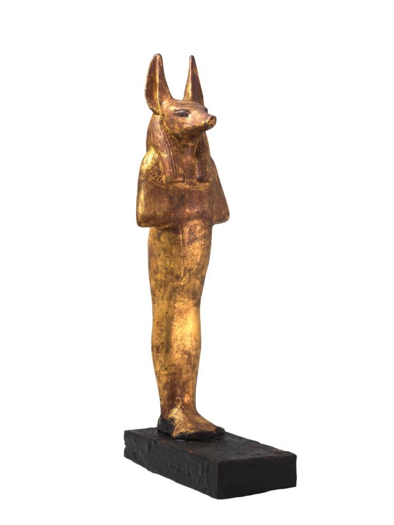 Gilded wooden jackal-headed figure of Duamutef from the tomb of Tutankhamun. ©Laboratoriorosso, Viterbo/Italy.
