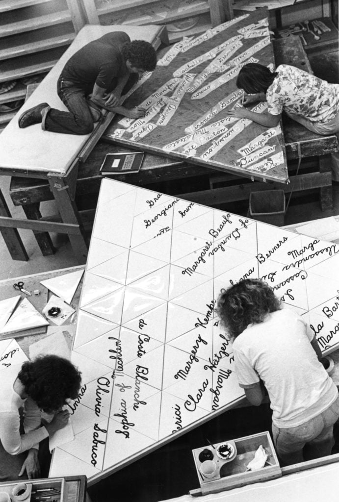 "The Dinner Party" Workers Painting Names on the Heritage Floor Tiles, (1978). Courtesy of Through the Flower Archive.