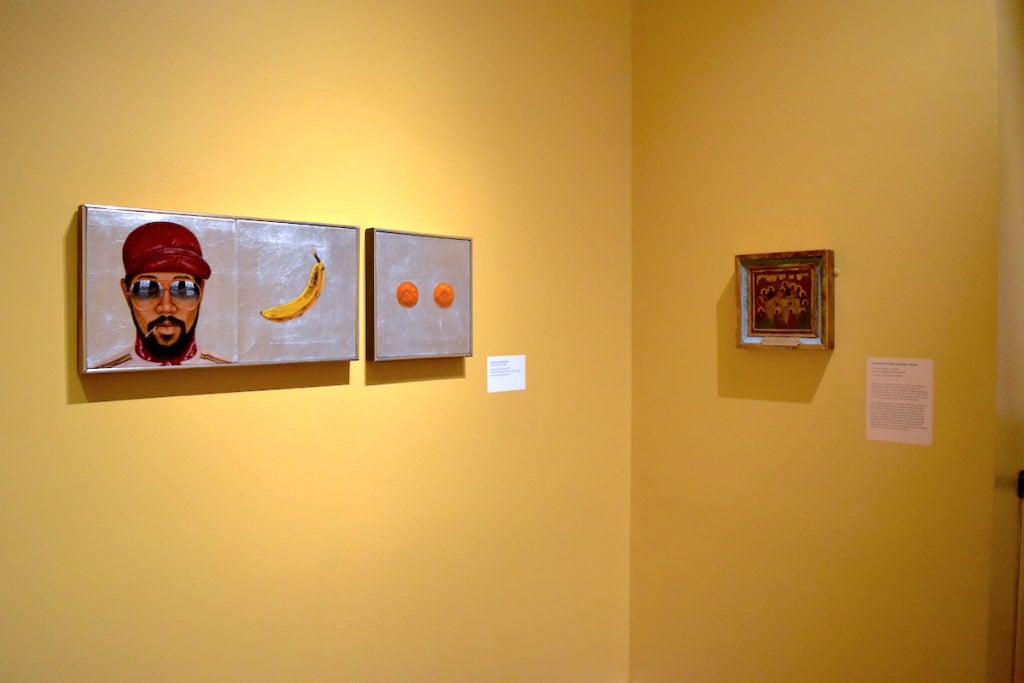 Barley L. Hendricks, Innocence & Friend (1977) [left] with a work in the New Orleans Museum of Art's "Early Renaissance" section. Image: Ben Davis.