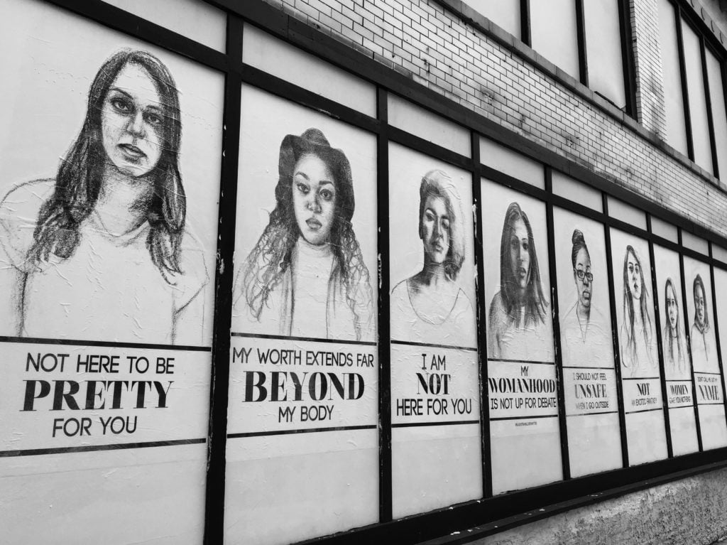 Installation shot of Tatyana Fazlalizadeh's street campaign "Stop Telling Women To Smile." Courtesy of the artist.