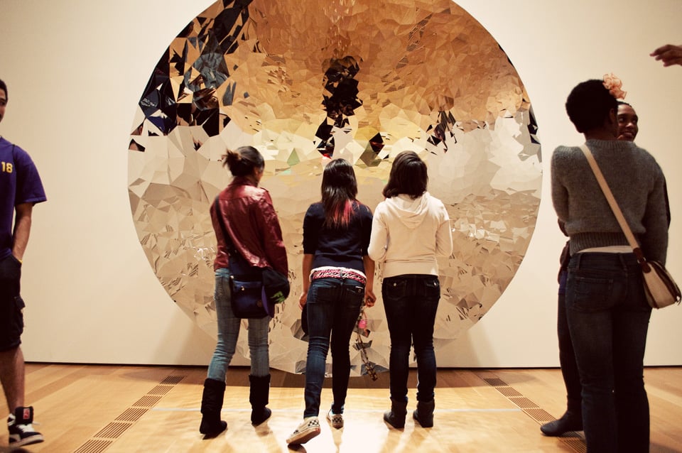 Visitors in front of a work by Anish Kapoor. Photo courtesy of the High Museum of Art, Atlanta. 