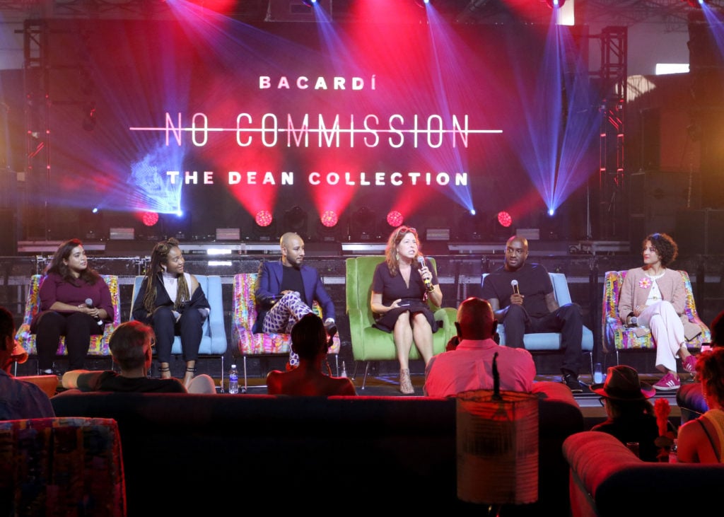 MIAMI, FL - DECEMBER 07: Nora Khan, Kimberly Drew, Swizz Beatz, Anne Pasternak, Virgil Abloh, and Carmen Aguilar y Wedge speak onstage as part of the "Future of Art" panel discussion during the VIP Preview of BACARDI, Swizz Beatz And The Dean Collection Bring NO COMMISSION Back to Miami to Celebrate 'Island Might" at Soho Studios on December 7, 2017 in Miami, Florida. Photo by John Parra/Getty Images for BACARDI.