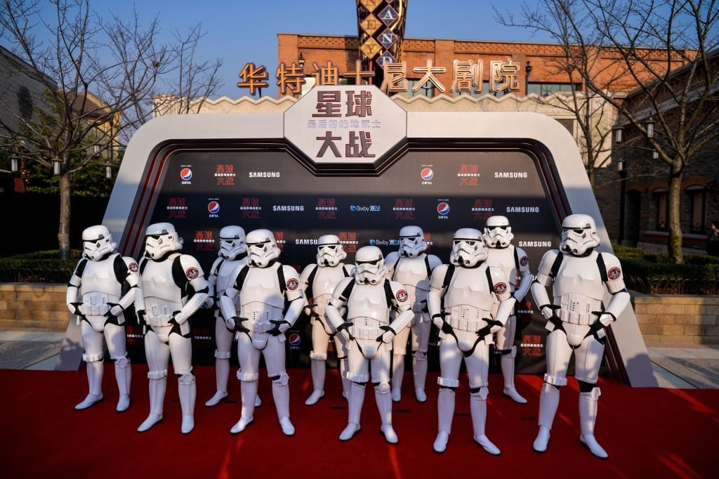 Stormtroopers pose at the red carpet for the Chinese premiere of 'Star Wars: The Last Jedi' at the Shanghai Disney Resort in Shanghai on December 20, 2017. Image courtesy Chandan Khanna/ /AFP/Getty Images.