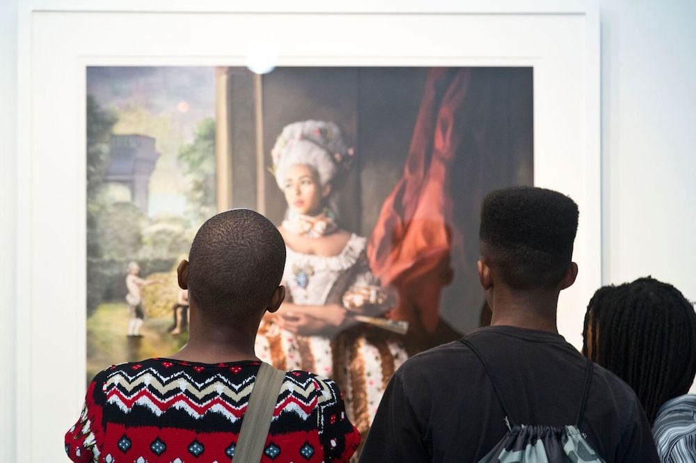 Visitors to "Fabiola Jean-Louis: Re-writing History." Image courtesy Alan Avery Art Gallery. 