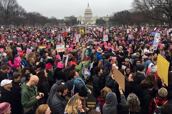 Demonstrators protest on the National Mall in Washington, DC, for the Women's march on January 21, 2017. Photo courtesy of Andrew Caballero-Reynolds/AFP/Getty Images.
