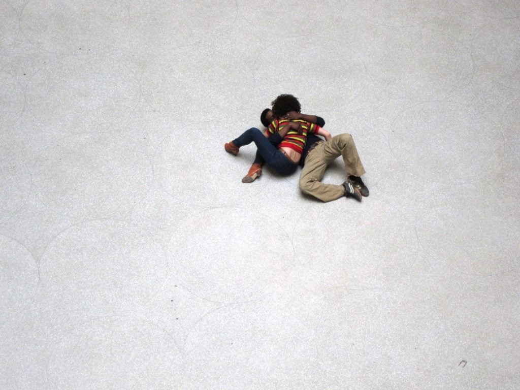 Still from Tino Sehgal's "The Kiss" at the Guggenheim Museum, 2010. Image via Flickr.
