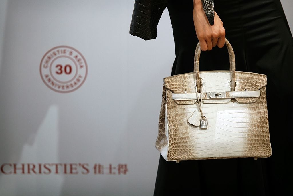 Christie's Hong Kong featuring a Matte White Himalaya Niloticus Crocodile Diamond Birkin with 18K gold and diamond hardware, one of the most valuable handbags in the world. Photo: Isaac Lawrence/AFP/Getty Images.