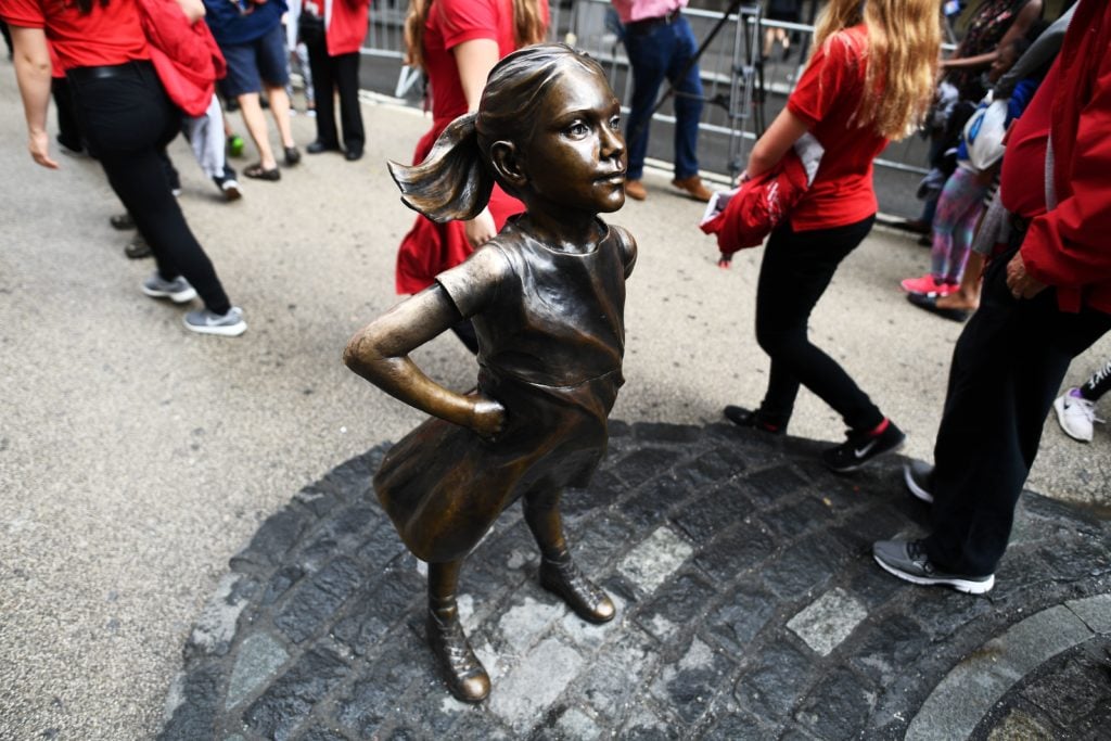 The so-called statue "fearless girl" in the financial district of New York.  Photo by Jewel Samad/AFP/Getty Images.