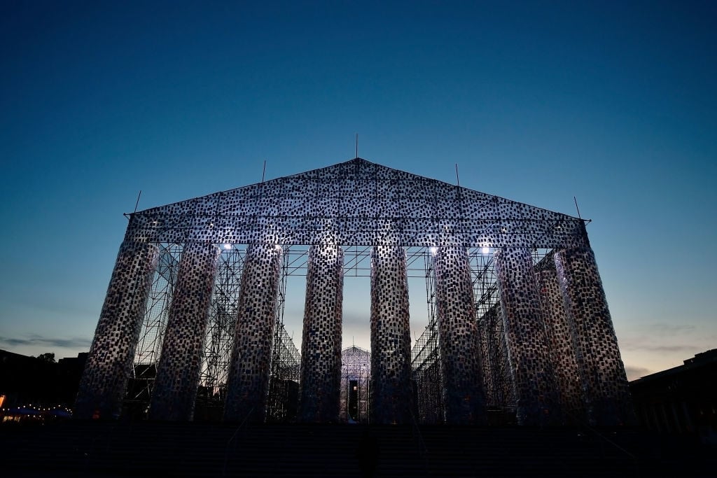 <i>The Parthenon of Books</i> by Marta Minujin on documenta14's opening night. Photo by Thomas Lohnes/Getty Images.