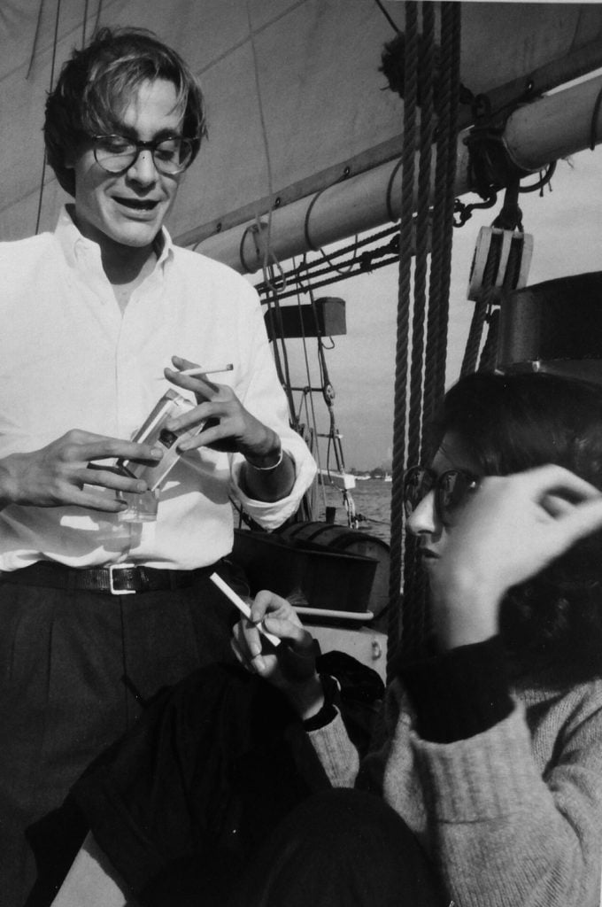 Craig Owens and Joan Simon at an Art in America office party on a sailboat rented from South Street Seaport, New York, date unknown. Photo: Elizabeth C. Baker.