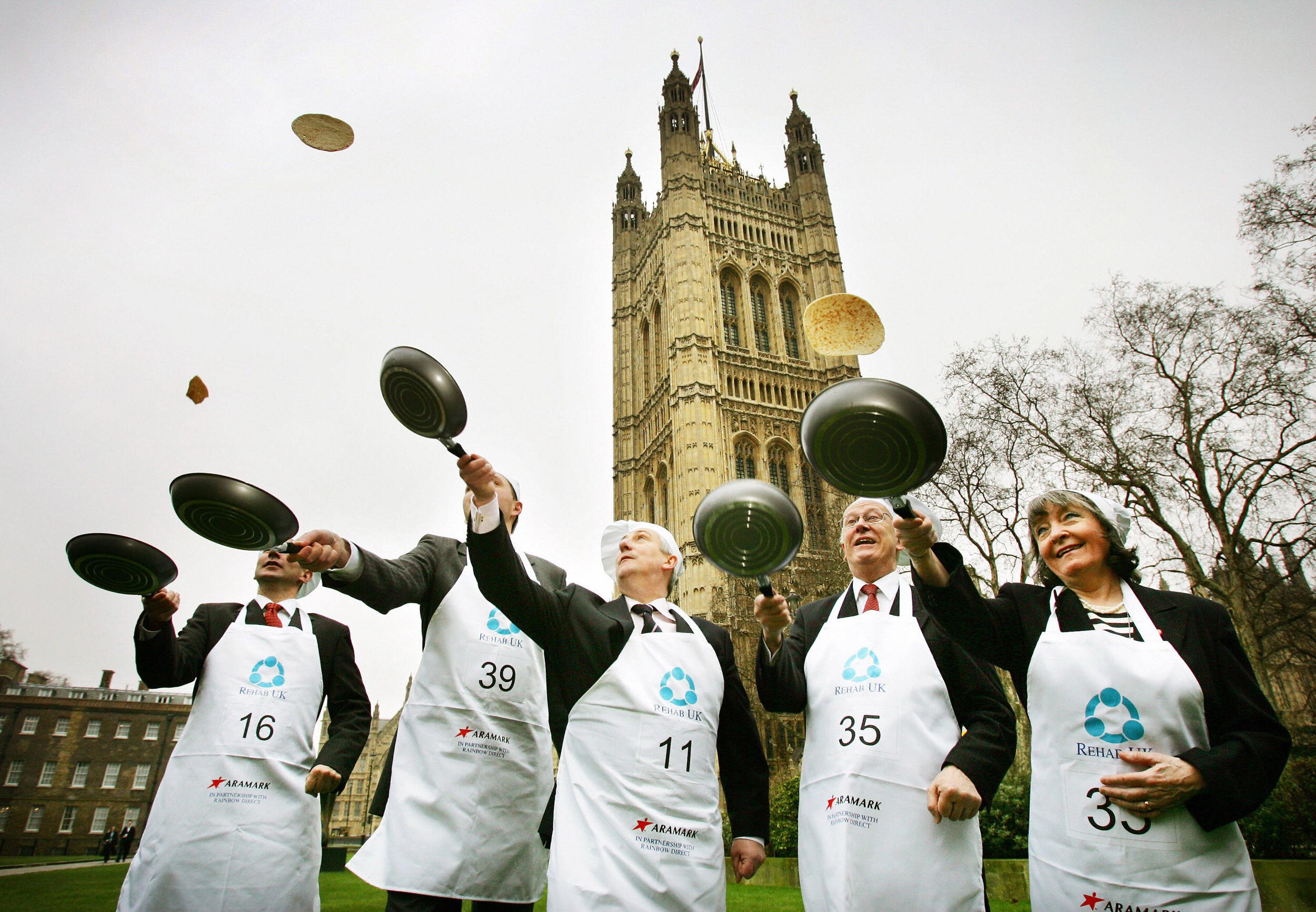 The art of flipping (pancakes) in London. Photo: Adrian Dennis/AFP/Getty Images.