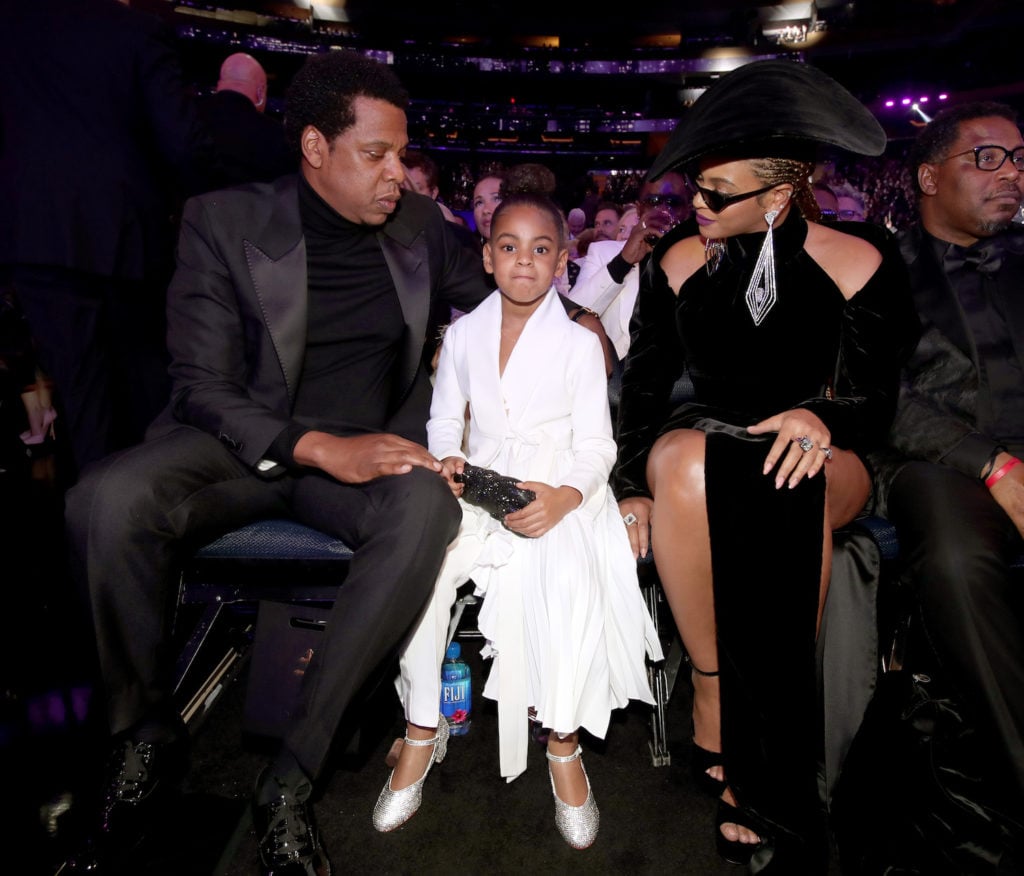 Jay-Z, Blue Ivy, and Beyoncé at the 60th Annual Grammy Awards in 2018. Photo by Christopher Polk/Getty Images for NARAS.