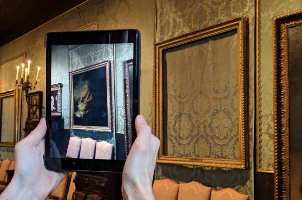 One of the Isabella Stewart Gardner Museum paintings stolen in 1990, Rembrandt van Rijn's Christ in the Storm on the Sea of Galilee, returned to its frame through the magic of augmented reality. Photo courtesy of the Cuseum.