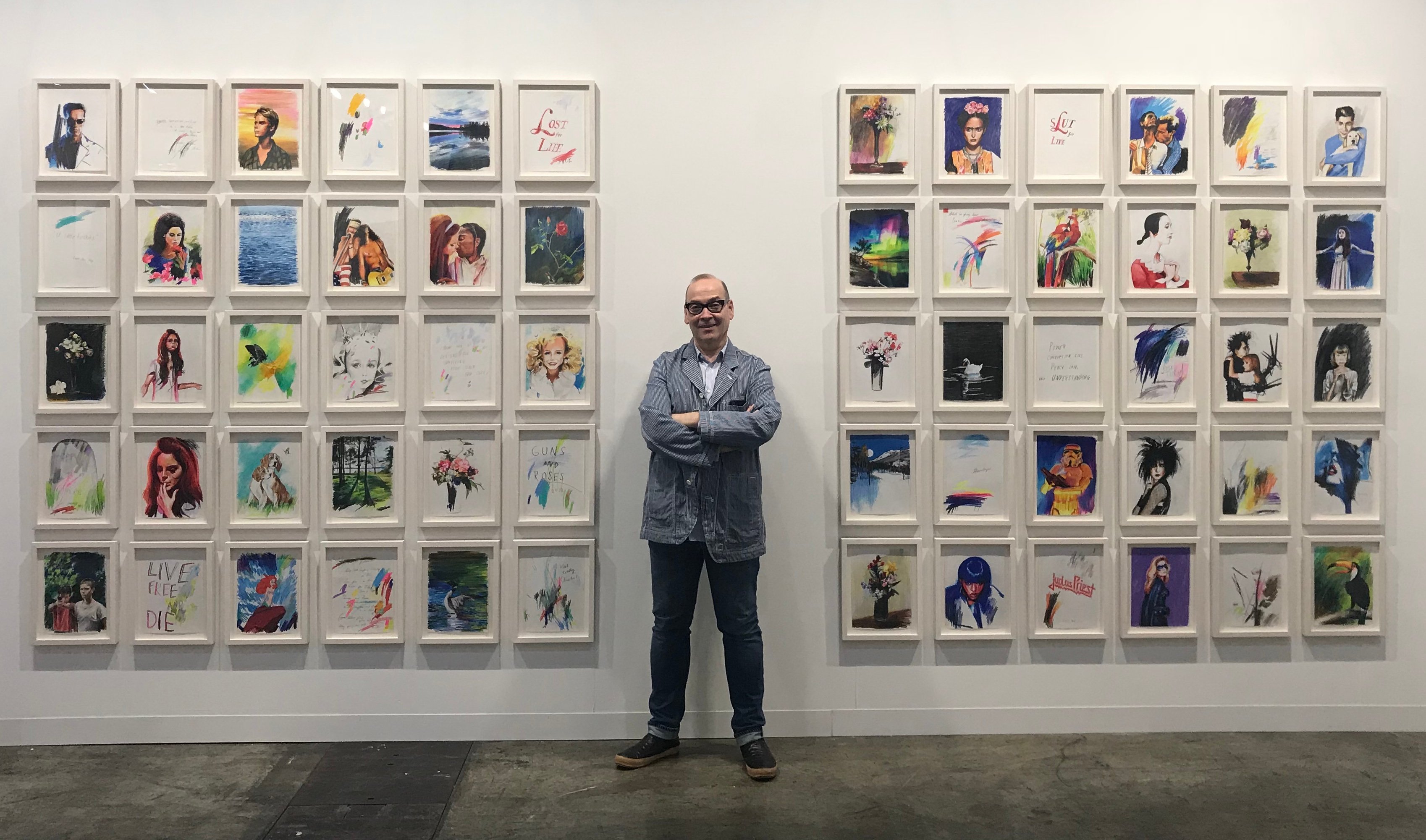 The dealer Jose Freire with Sam McKinniss's drawings at Art Basel Hong Kong in 2018, the gallery's final art fair. Photo by Andrew Goldstein.