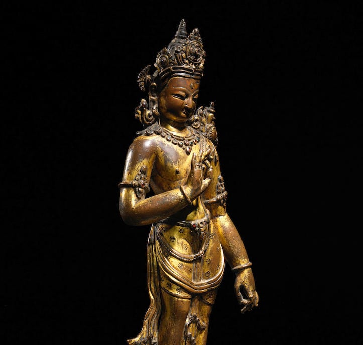 A gilt copper figure of Maitreye, Nepal, 14th century. Estimate $350,000–450,000. Photo courtesy of Bonhams.
