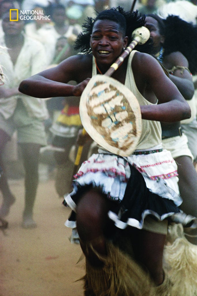 South African goldminers were “entranced by thundering drums” during “vigorous tribal dances,” a 1962 issue reported. Photograph by Kip Ross. Image courtesy National Geographic.