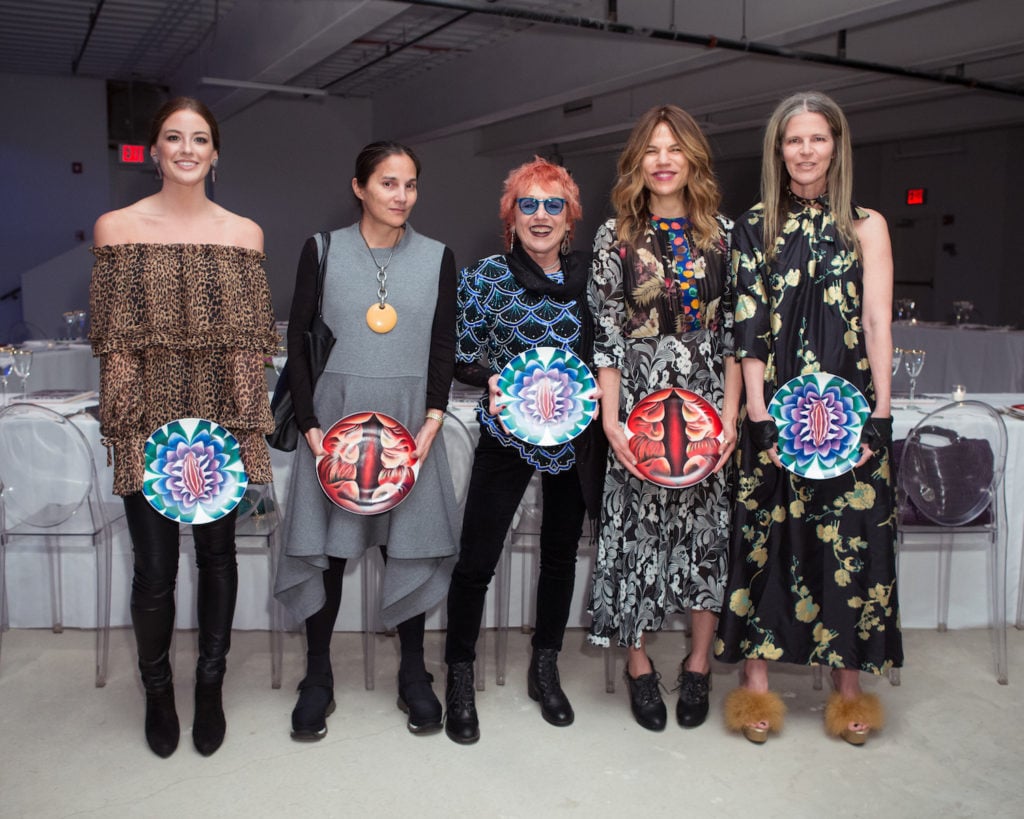 Laura Currie, Jody Quon, Judy Chicago, Doreen Renee, and Yvonne Force Villareal with the Prospect NY's new plates based on <em>The Dinner Party</em>. Photo courtesy of BFA. 