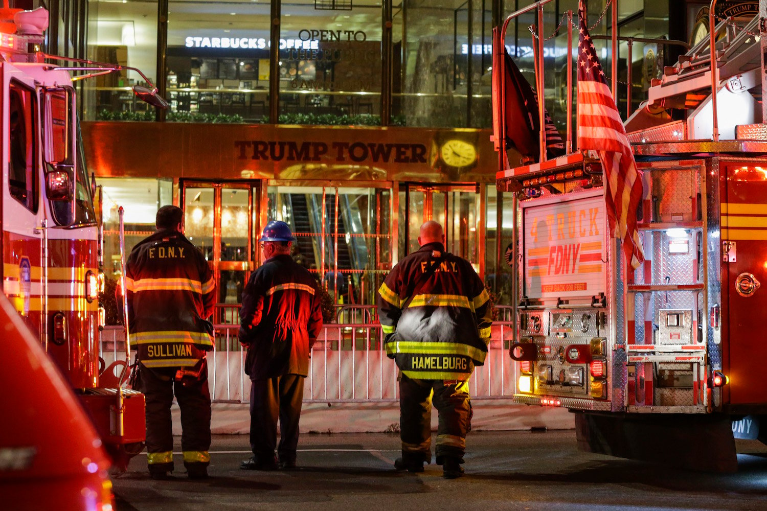 First responders assess the scene of a fire at Trump Tower on April 7, 2018 in New York City. Art collector Todd Brassner died in the four-alarm blaze, which broke out on the 50th floor. Photo by Eduardo Munoz Alvarez/Getty Images.