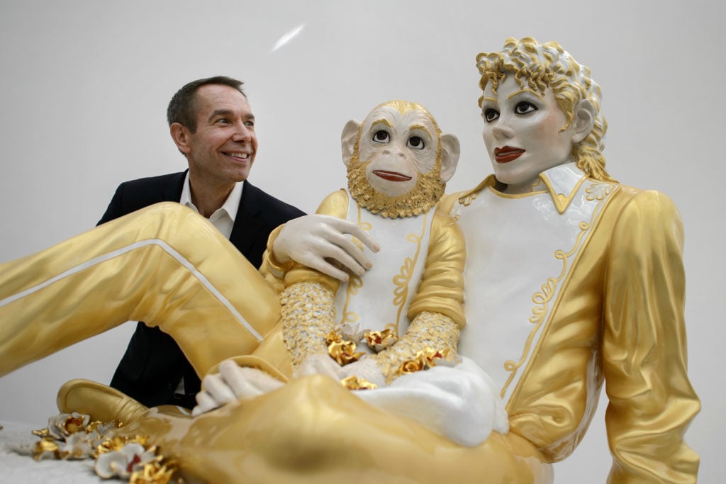 US artist Jeff Koons with Michael Jackson and Bubbles Photo by Fabrice Coffrini/AFP/GettyImages.