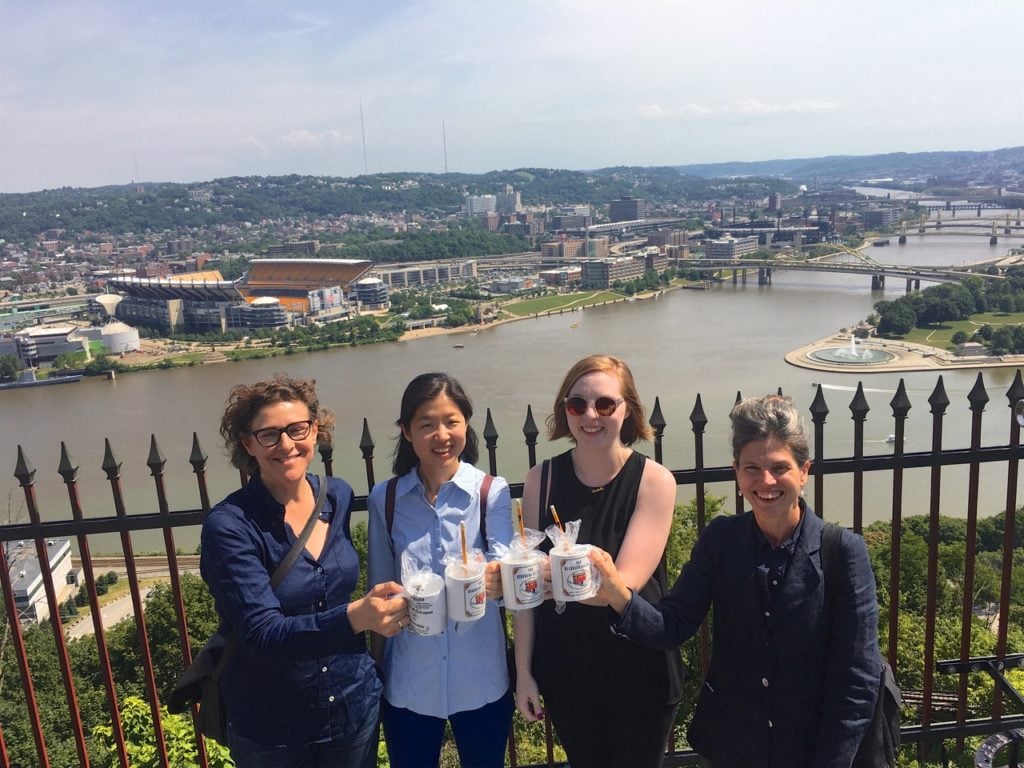 Zoe Leonard and the Carnegie International curatorial team on Mt. Washington after a ride on the Duquesne Incline (2017). Left to right: Zoe Leonard; Liz Park, associate curator; Ashley McNelis, curatorial assistant; Ingrid Schaffner, curator. Photo by Chris Taylor.