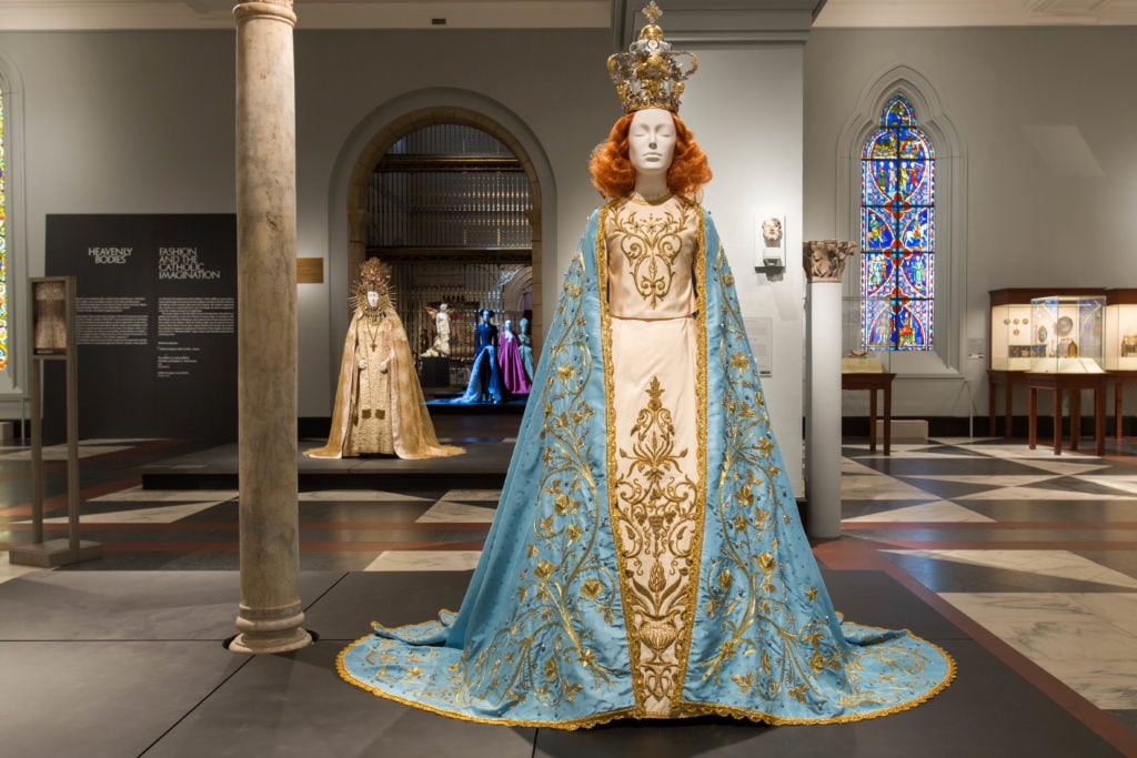 Riccardo Tisci, Statuary Vestment for the Madonna Delle Grazie, on view in "Heavenly Bodies" at the Met Fifth Avenue, European Gallery. Photo courtesy of the Metropolitan Museum of Art. 