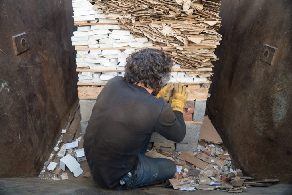 Kevin Harman making Skip 16 (2018). Photo by Christopher L. Cook, courtesy of the Artist and Ingleby, Edinburgh.
