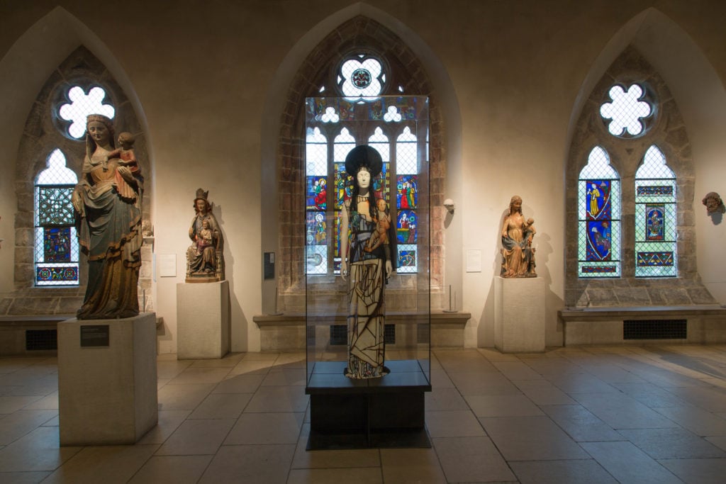Installation view of "Heavenly Bodies" at the Cloisters, Early Gothic Hall. Photo courtesy of the Metropolitan Museum of Art. 
