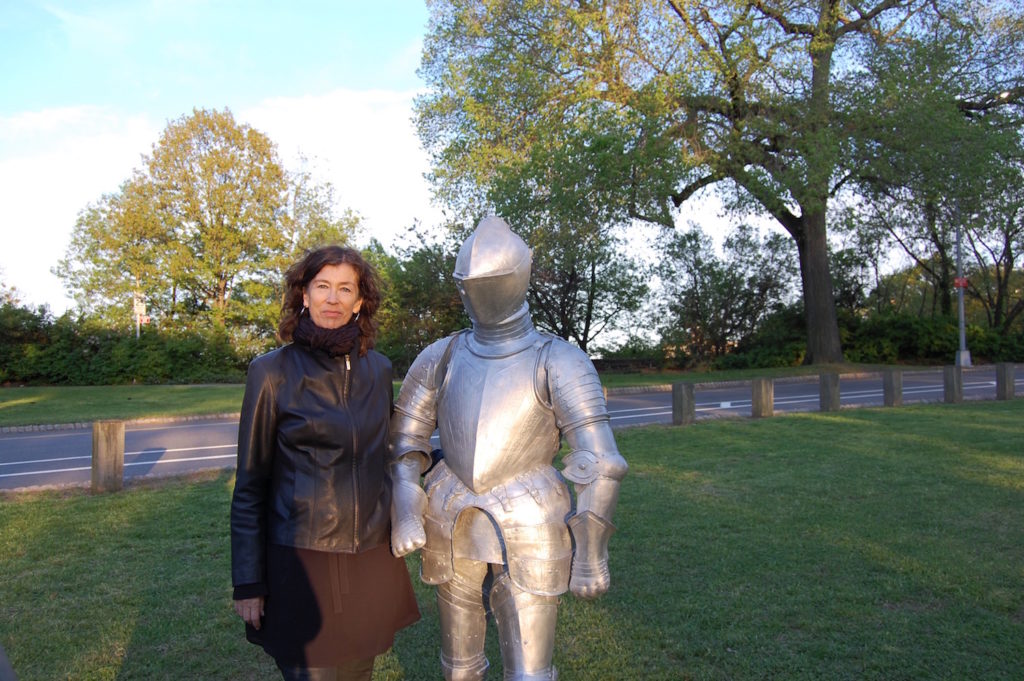 Steinunn Thorarinsdottir with a sculpture from her exhibition "ARMORS" at Fort Tryon Park. Photo by Sarah Cascone. 